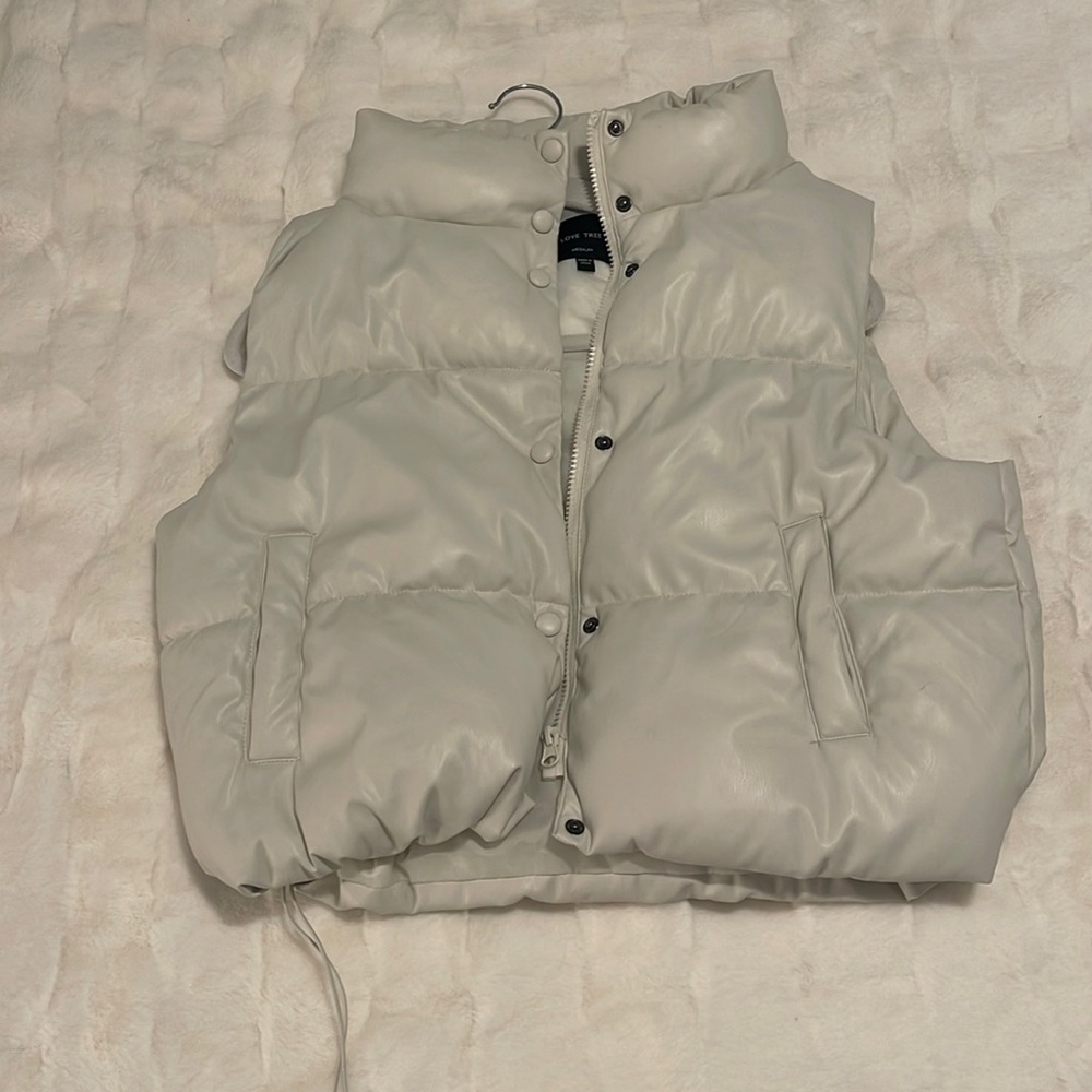 Fairly new, Love Tree faux leather puffer vest in cream, size medium